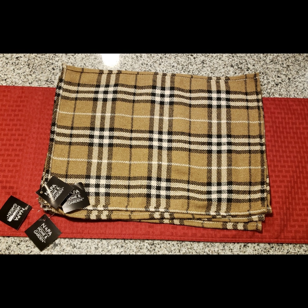 Four new with tags plaid place mats.